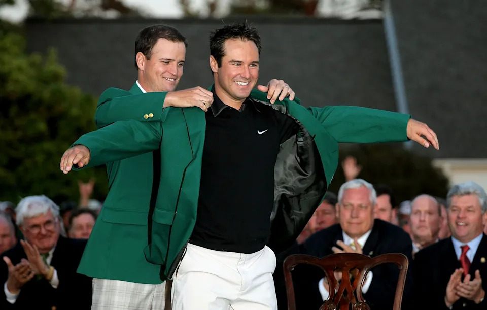 AUGUSTA, GA - APRIL 13:  Zach Johnson presents the green jacket to Trevor Immelman of South Africa after Immelman's three-stroke victory at the 2008 Masters Tournament at Augusta National Golf Club on April 13, 2008 in Augusta, Georgia.  (Photo by Harry How/Getty Images)