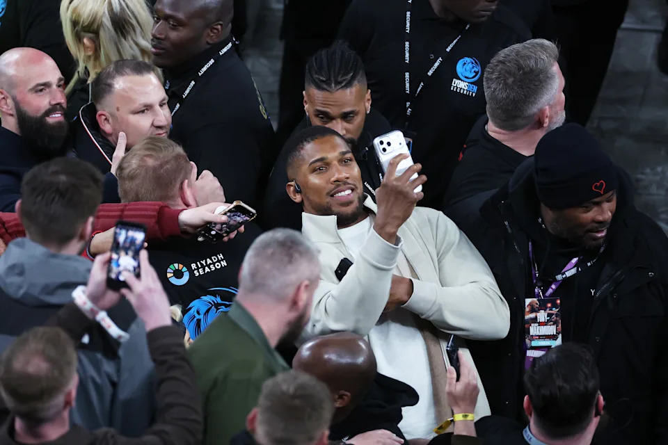 LONDON, ENGLAND - APRIL 11: Anthony Joshua interacts with fans after the Heavyweight fight between Tyson Fury and Arslanbek Makhmudov at Tottenham Hotspur Stadium on April 11, 2026 in London, England. (Photo by Alex Livesey/Getty Images for Netflix)