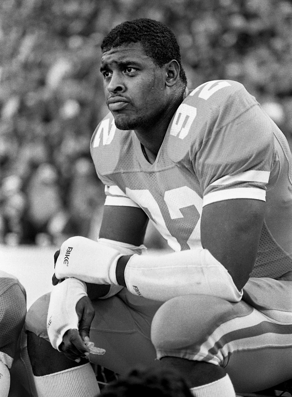 Tennessee senior Reggie White, a candidate for the prestigious Lobardi Trophy that goes to the nation’s outstanding lineman, rests on the sidelines during the Vols 34-24 victory over Vanderbilt before 93,426 fans at Neyland Stadium in Knoxville on Nov. 26, 1983.