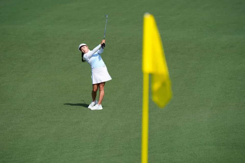 Arianna Lau hits her fairway shot on the second hole during the final round of the Augusta National Women's Amateur golf tournament at Augusta National Golf Club.