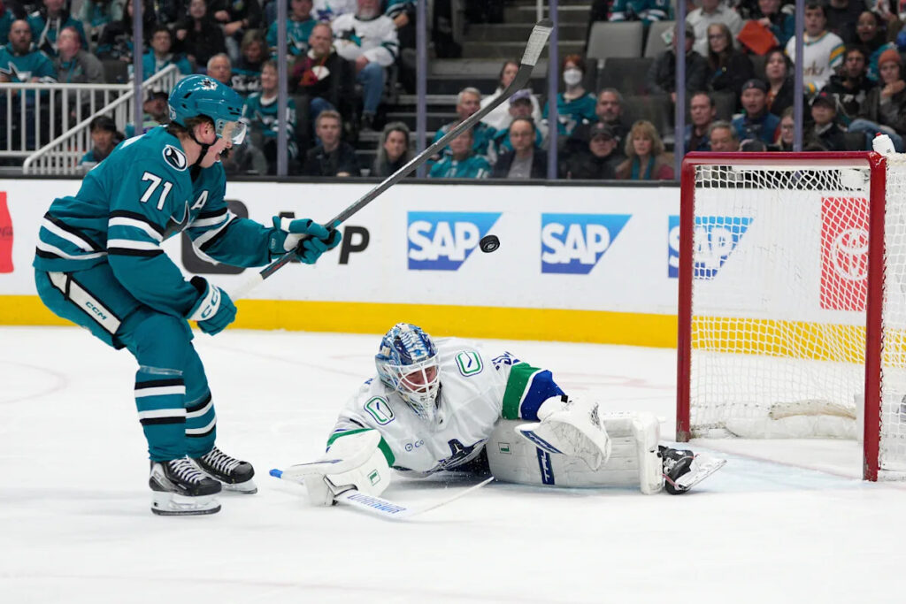 The Canucks deal a blow to the slim playoff hopes for the Sharks with a 4-3 shootout win