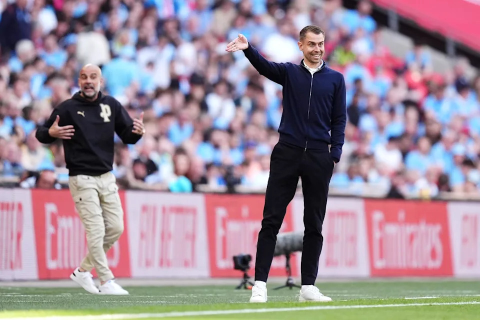 Tonda Eckert directs from the touchline (PA)