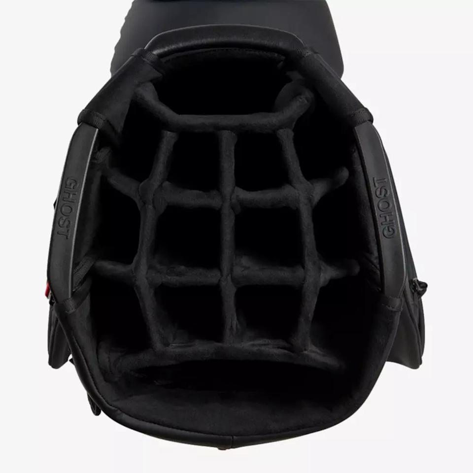 A top view of an open black baseball glove with a unique grid-like pocket structure and the word GHOST printed on both sides near the opening—crafted with precision, just like the best golf bags 2026.