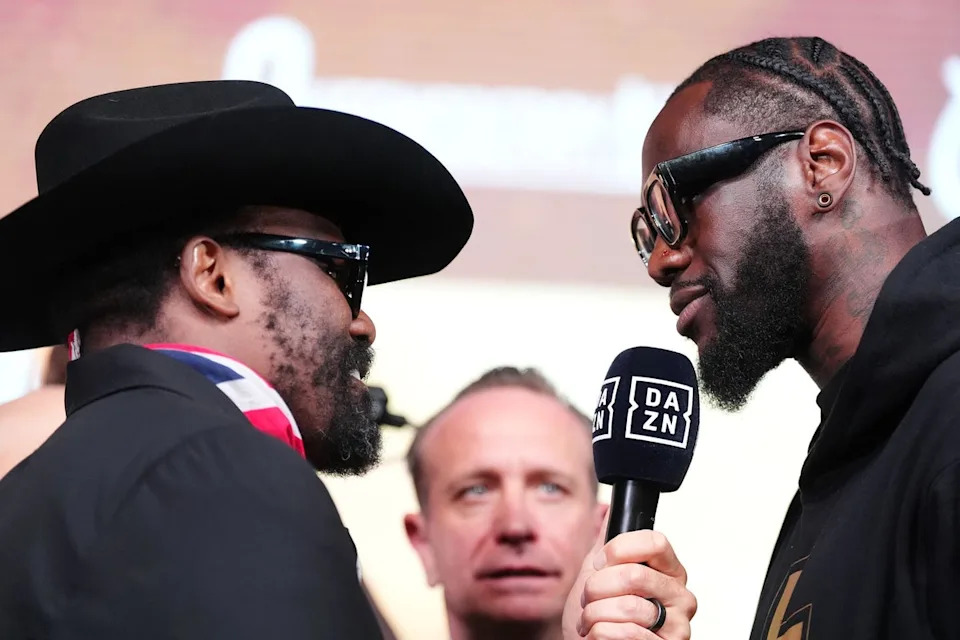 Chisora (left) and Deontay Wilder exchange words at their press conference (Adam Davy/PA Wire)
