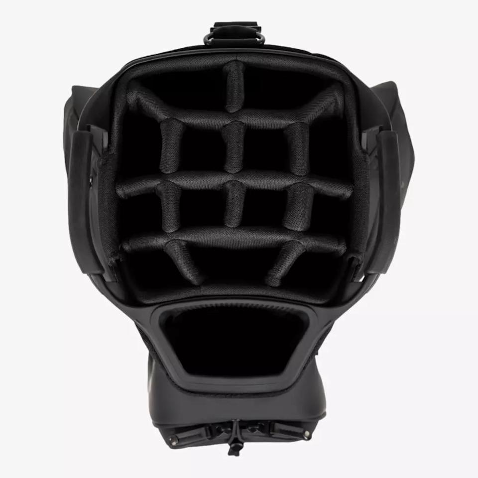 Top-down view of the interior padding and structure of a black catcher's mask, showing grid-like foam padding for protection and comfort—crafted with attention to detail like the best golf bags 2026.