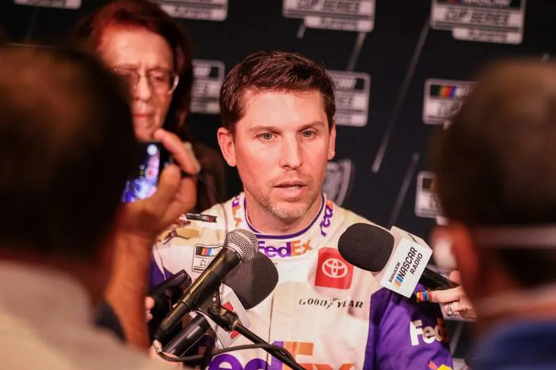 CHARLOTTE, NC – SEPTEMBER 01: Denny Hamlin, 11 of Joe Gibbs Racing, speaks to the media during the 2022 NASCAR, Motorsport, USA Cup Series Playoff Media Day on September 1, 2022, at the Charlotte Convention Center in Charlotte, NC. Photo by David Jensen/Icon Sportswire AUTO: SEP 01 NASCAR Cup Series Playoff Media Day Icon220901004