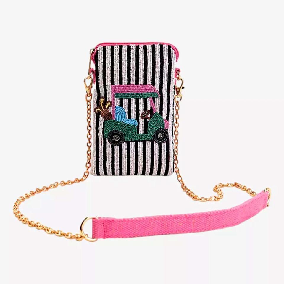 A small, beaded crossbody bag with a gold chain strap, pink fabric shoulder pad, black and white stripes, and an embroidered green golf cart with two dogs—perfect for Mother's Day gifts and stylish gifts under $50.