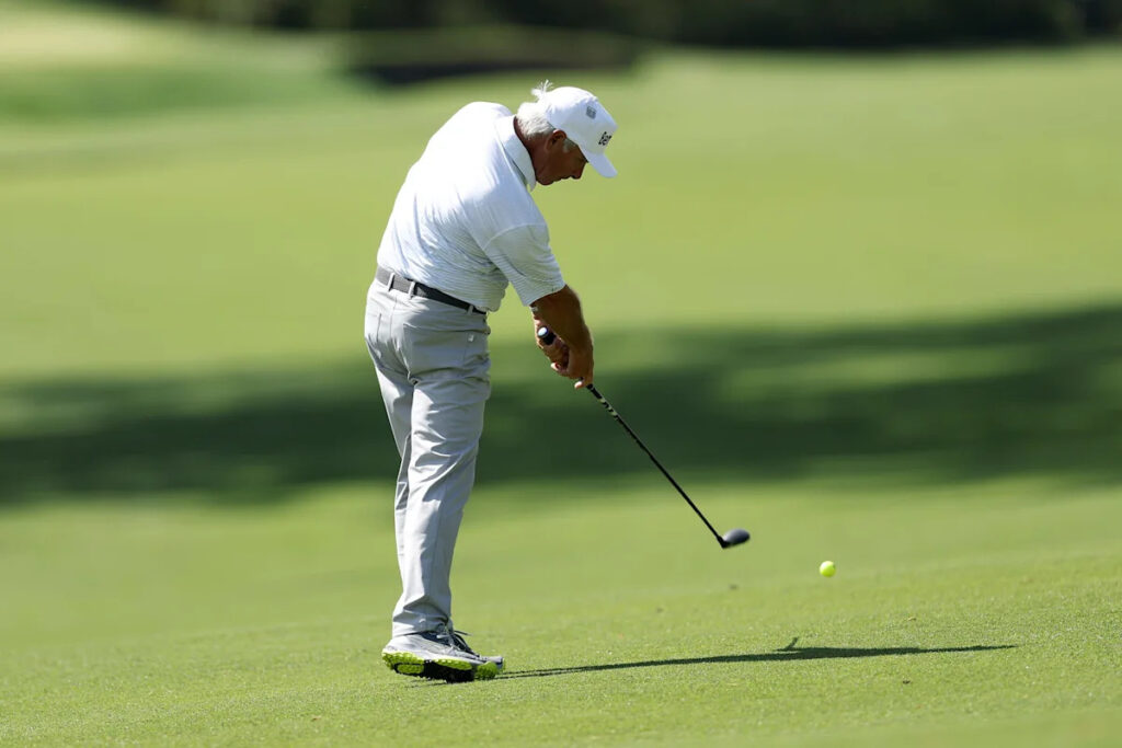 Why does Fred Couples uses a yellow ball at the Masters in 2026?