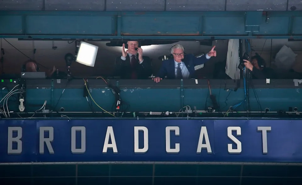 Fans cheer as broadcaster John Garrett waves to fans during the Vancouver Canucks NHL game against the <a class="link " href="https://sports.yahoo.com/nhl/teams/calgary/" data-i13n="sec:content-canvas;subsec:anchor_text;elm:context_link" data-ylk="slk:Calgary Flames;sec:content-canvas;subsec:anchor_text;elm:context_link;itc:0" data-yga="{"yLinkElement":"context_link","yModuleName":"content-canvas","yLinkText":"Calgary Flames","ySubModuleName":"anchor_text","yHasCommerce":false}">Calgary Flames</a> at Rogers Arena April 8, 2023 in <a class="link " href="https://sports.yahoo.com/nhl/teams/vancouver/" data-i13n="sec:content-canvas;subsec:anchor_text;elm:context_link" data-ylk="slk:Vancouver;sec:content-canvas;subsec:anchor_text;elm:context_link;itc:0" data-yga="{"yLinkElement":"context_link","yModuleName":"content-canvas","yLinkText":"Vancouver","ySubModuleName":"anchor_text","yHasCommerce":false}">Vancouver</a>, British Columbia, Canada. NHLI via Getty Images