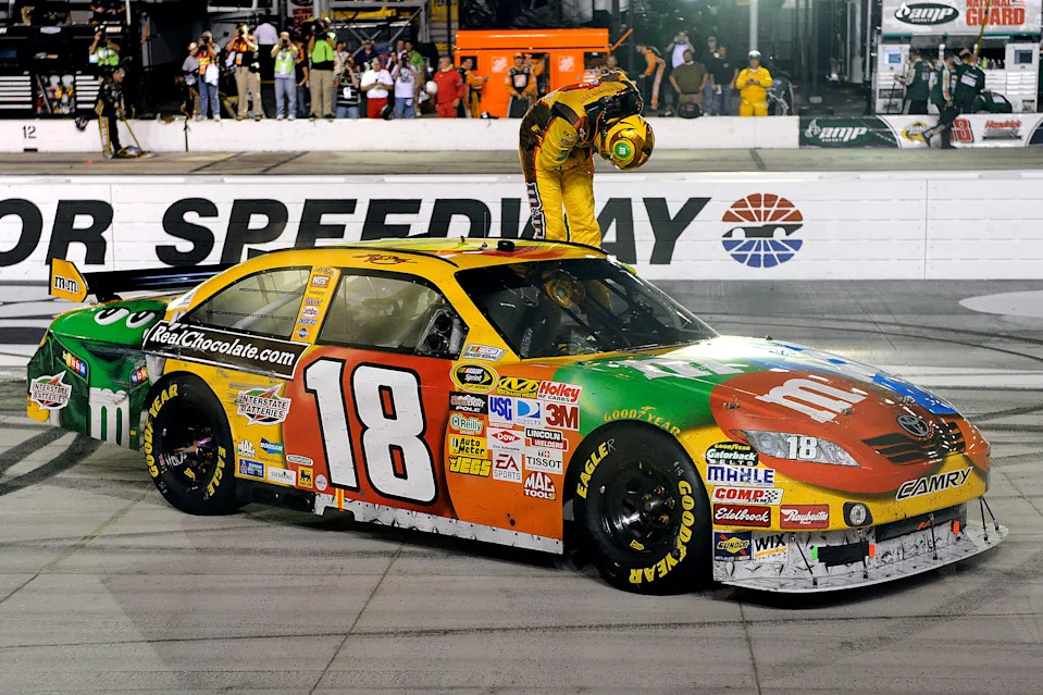 BRISTOL, TN - AUGUST 22:  Kyle Busch, driver of the #18 M&M's Toyota, takes a bow on track after winning the NASCAR Sprint Cup Series Sharpie 500 at Bristol Motor Speedway on August 22, 2009 in Bristol, Tennessee.  (Photo by John Harrelson/Getty Images)