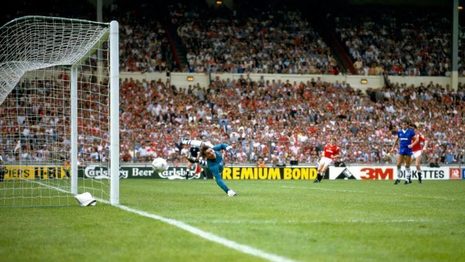 Norman Whiteside scores