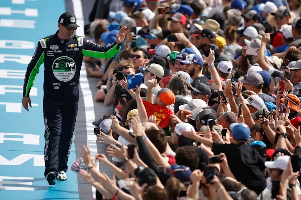 Kyle Busch with fans, No. 8 Richard Childress Racing Chevrolet