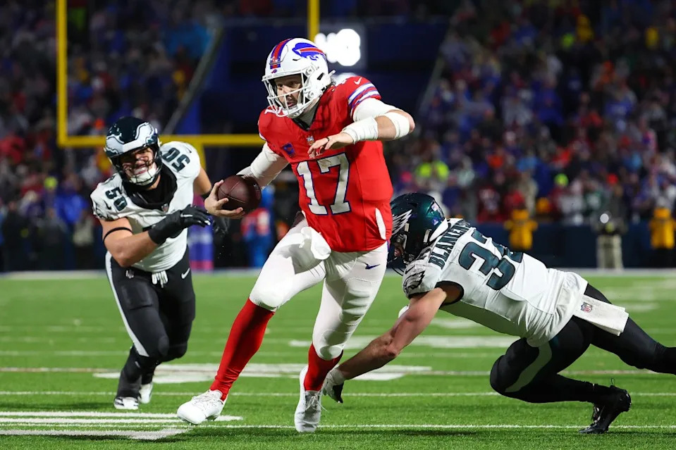 <a class="link " href="https://sports.yahoo.com/nfl/players/30977/" data-i13n="sec:content-canvas;subsec:anchor_text;elm:context_link" data-ylk="slk:Josh Allen;sec:content-canvas;subsec:anchor_text;elm:context_link;itc:0" data-yga="{"yLinkElement":"context_link","yModuleName":"content-canvas","yLinkText":"Josh Allen","ySubModuleName":"anchor_text","yHasCommerce":false}">Josh Allen</a> runs with the ball during the Bills’ December 2025 game. Getty Images