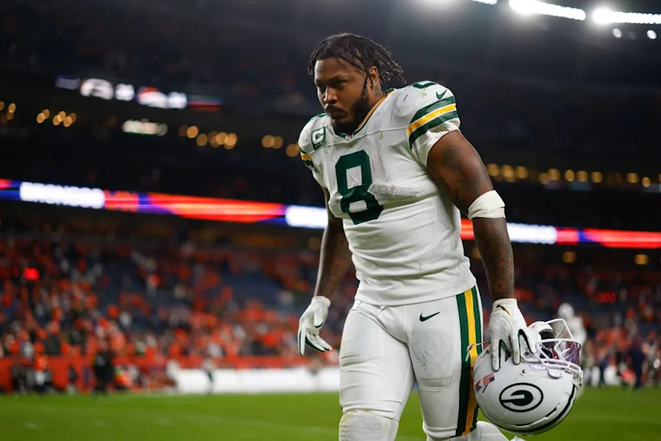 Josh Jacobs of the Green Bay Packers jogs off the field after the 26-34 loss to the <a class="link " href="https://sports.yahoo.com/nfl/teams/denver/" data-i13n="sec:content-canvas;subsec:anchor_text;elm:context_link" data-ylk="slk:Denver Broncos;sec:content-canvas;subsec:anchor_text;elm:context_link;itc:0" data-yga="{"yLinkElement":"context_link","yModuleName":"content-canvas","yLinkText":"Denver Broncos","ySubModuleName":"anchor_text","yHasCommerce":false}">Denver Broncos</a> at Empower Field at Mile High on December 14, 2025 in Denver, Colorado. Getty Images