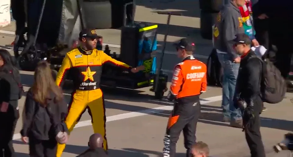 Bubba Wallace attempts to walk away from Chris Bell after placing 29th. NASCAR