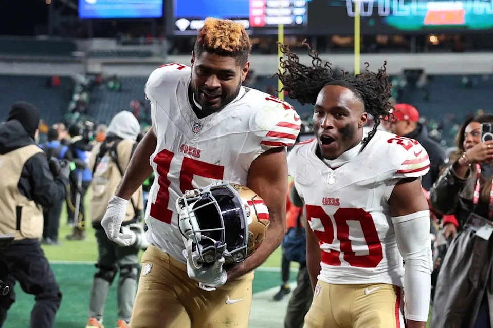 Jauan Jennings and <a class="link " href="https://sports.yahoo.com/nfl/players/41884/" data-i13n="sec:content-canvas;subsec:anchor_text;elm:context_link" data-ylk="slk:Upton Stout;sec:content-canvas;subsec:anchor_text;elm:context_link;itc:0" data-yga="{"yLinkElement":"context_link","yModuleName":"content-canvas","yLinkText":"Upton Stout","ySubModuleName":"anchor_text","yHasCommerce":false}">Upton Stout</a> of the San Francisco 49ers celebrate after their team’s 23-19 win against the <a class="link " href="https://sports.yahoo.com/nfl/teams/philadelphia/" data-i13n="sec:content-canvas;subsec:anchor_text;elm:context_link" data-ylk="slk:Philadelphia Eagles;sec:content-canvas;subsec:anchor_text;elm:context_link;itc:0" data-yga="{"yLinkElement":"context_link","yModuleName":"content-canvas","yLinkText":"Philadelphia Eagles","ySubModuleName":"anchor_text","yHasCommerce":false}">Philadelphia Eagles</a> in the NFC Wild Card Playoff game at Lincoln Financial Field on January 11, 2026 in <a class="link " href="https://sports.yahoo.com/nfl/teams/philadelphia/" data-i13n="sec:content-canvas;subsec:anchor_text;elm:context_link" data-ylk="slk:Philadelphia;sec:content-canvas;subsec:anchor_text;elm:context_link;itc:0" data-yga="{"yLinkElement":"context_link","yModuleName":"content-canvas","yLinkText":"Philadelphia","ySubModuleName":"anchor_text","yHasCommerce":false}">Philadelphia</a>, Pennsylvania. Getty Images