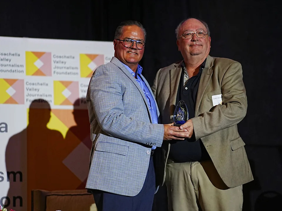 Larry Bohannan, right, is inducted into the 2026 Media Hall of Fame during the Coachella Valley Journalism Awards by CVJF president Randy Lovely in Rancho Mirage, Calif., Feb. 24, 2026.