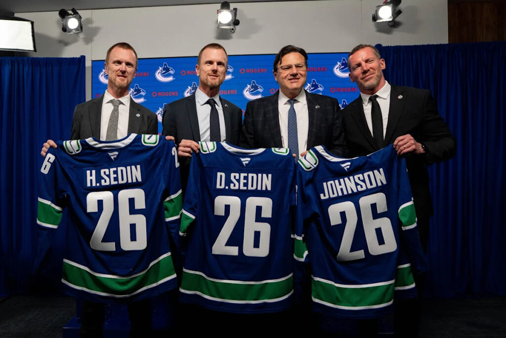 Canucks hire Ryan Johnson as GM, Sedin twins to share president of hockey operations