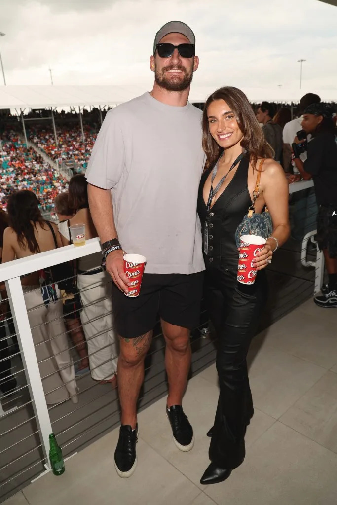 Joey Bosa (L) and Amanda Kassdikian attends the Celebrity Friends For F1 Miami Grand Prix Race Getty Images for Raising Cane's