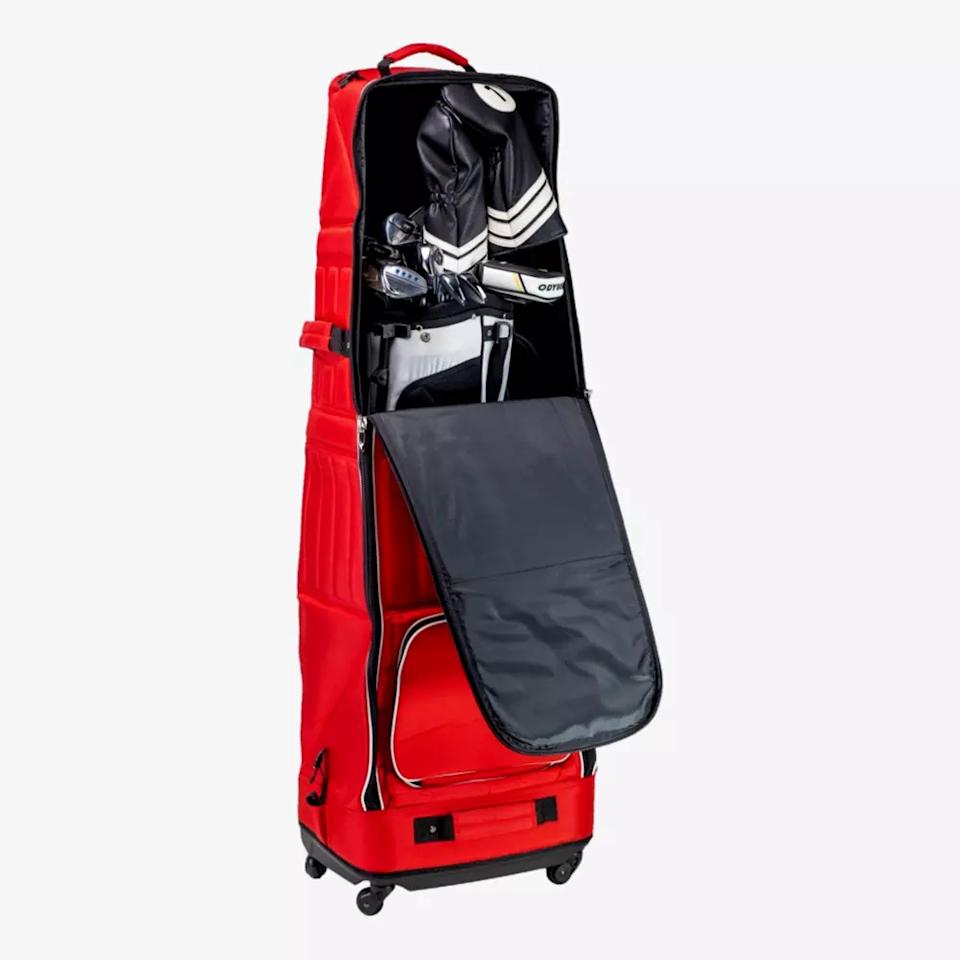 A red wheeled travel case is open to reveal a set of golf clubs, a golf bag, and space for the best golf rangefinders inside. The case has a partially unzipped cover and stands upright on four wheels.