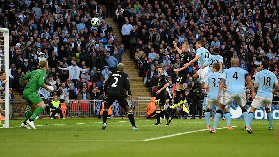 Ben Watson scores a header