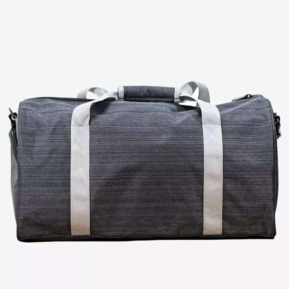 A gray duffel bag with white handles and a padded grip, photographed against a plain white background—perfect for carrying essentials like the best golf rangefinders to your next game.