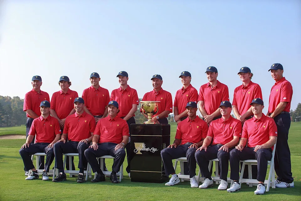 The 2013 U.S. Presidents Cup team: Zach Johnson, Matt Kuchar, Phil Mickelson, Tiger Woods, Steve Stricker, Hunter Mahan, Jay Haas, Jason Dufner, Bill Haas, Webb Simpson, Fred Couples, Jordan Spieth, Keegan Bradley and Davis Love III at Muirfield Village Golf Club.