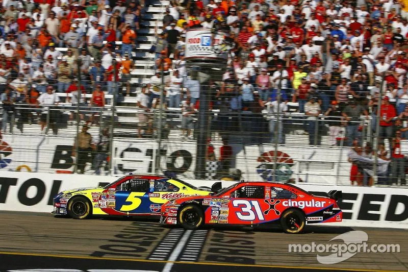 Kyle Busch takes the checkered flag ahead of Jeff Burton