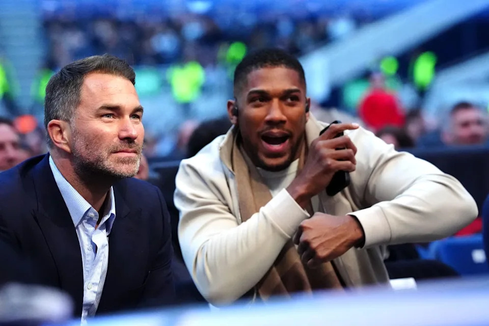 Former world heavyweight champion boxer Anthony Joshua (right) is one of Matchroom’s biggest names (PA Wire)