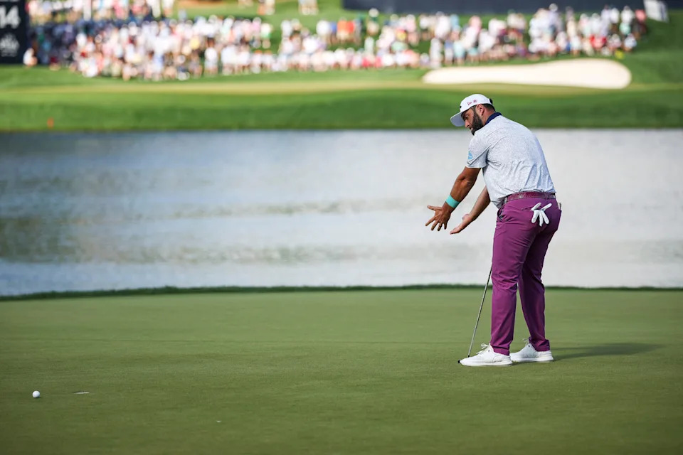 Jon Rahm reacts after a missed putt on the 17th green during the third round of the PGA Championship at Quail Hollow Club.