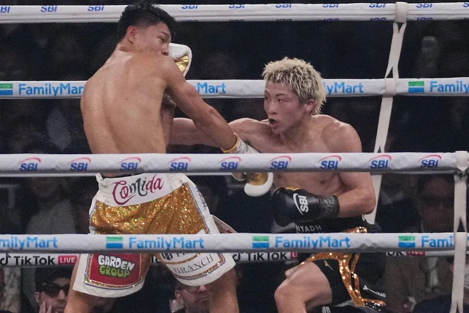 Inoue (right) on the attack in a back-and-forth fight, in which he was just a step ahead (AP)