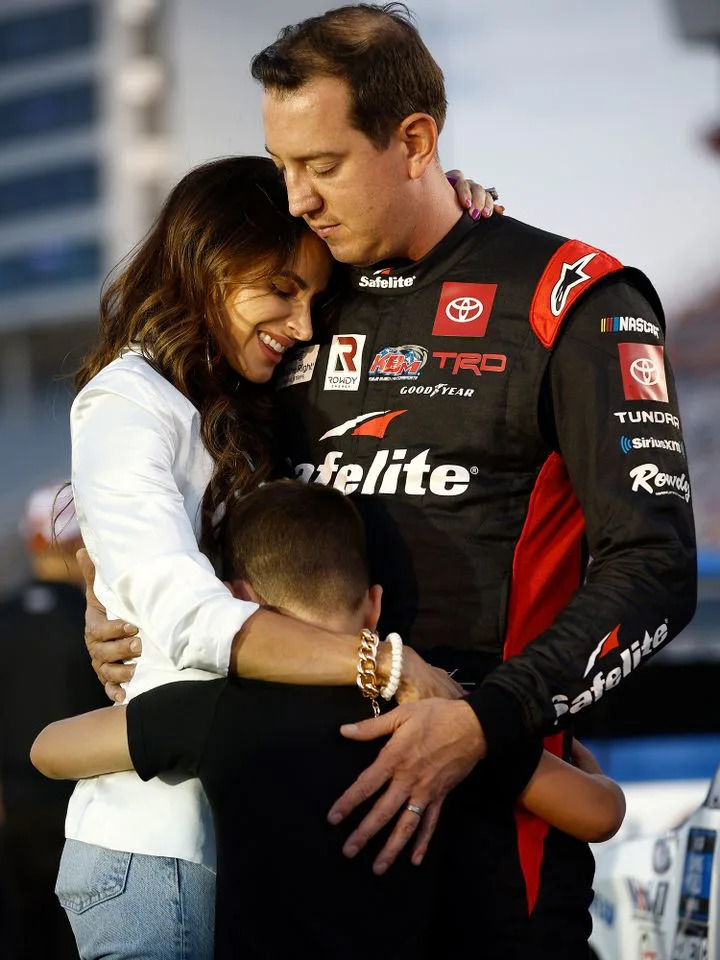 Kyle Busch, Samantha Bsuch, and Brexton Busch prior to the NASCAR Camping World Truck Series North Carolina Education Lottery 200 on May 27, 2022 in Concord, North Carolina.Credit: Jared C. Tilton/Getty