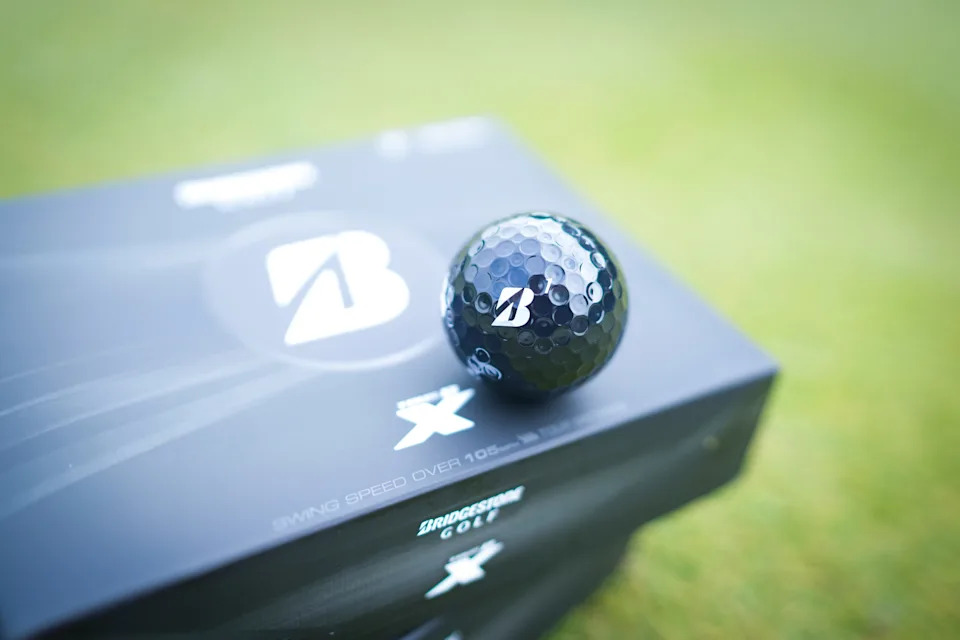 The black Bridgestone Tour B X ball.