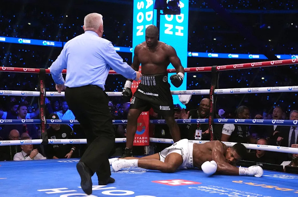Daniel Dubois (centre) handed Anthony Joshua his fourth career loss and second by stoppage (PA Wire)