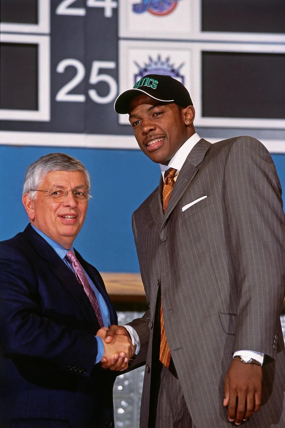 NEW YORK CITY – JUNE 27: Joe Johnson shakes hands with NBA Commissioner David Stern after he was selected number ten overall by the Boston Celtics during the 2001 NBA Draft on June 27, 2001 at Madison Square Garden in New York City. NOTE TO USER: User expressly acknowledges and agrees that, by downloading and or using this photograph, User is consenting to the terms and conditions of the Getty Images License Agreement. Mandatory Copyright Notice: Copyright 2001 NBAE (Photo by Jesse D. Garrabrant/NBAE via Getty Images) | NBAE via Getty Images