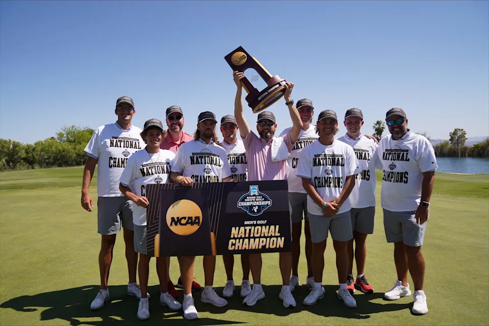 Florida Southern College's men's golf team celebrates the 2026 national championship at Boulder Creek Golf Club in Boulder City, Nevada, on May 22, 2026.