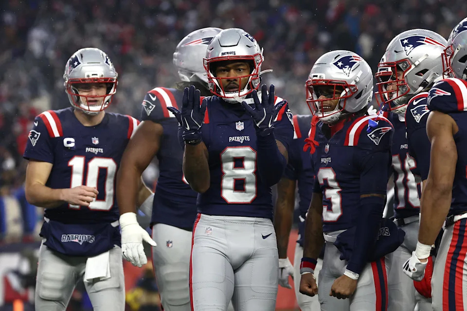 FOXBOROUGH, MASSACHUSETTS - JANUARY 18: Stefon Diggs #8 of the New England Patriots celebrates with teammates after scoring a touchdown against the Houston Texans during the second quarter in the AFC Divisional Playoff game at Gillette Stadium on January 18, 2026 in Foxborough, Massachusetts. (Photo by Winslow Townson/Getty Images)