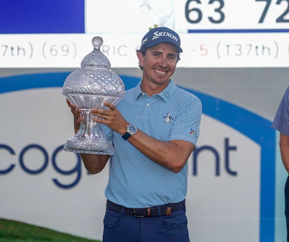 Nico Echavarria poses with the trophy after winning the Cognizant Classic in the Palm Beaches at PGA National Resort & Spa on Sunday, March 1, 2026, in Palm Beach Gardens, FL.