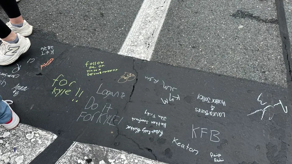 Fans leave messages for Kyle Busch at the finish line of Charlotte Motor Speedway ahead of Sunday's Coca-Cola 600. - Kyle Feldscher/CNN