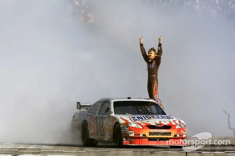 Race winner Kyle Busch celebrates