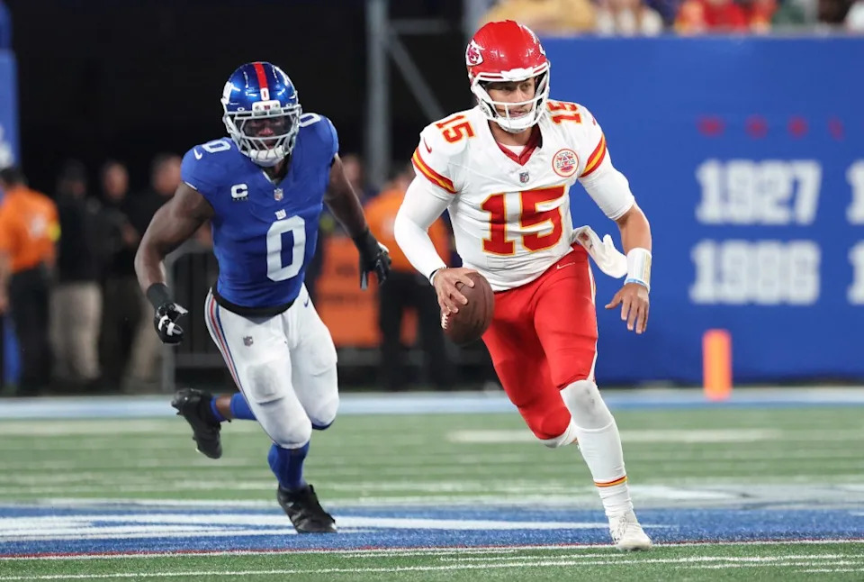 Patrick Mahomes runs with the ball during a September 2025 game for the Chiefs. Charles Wenzelberg