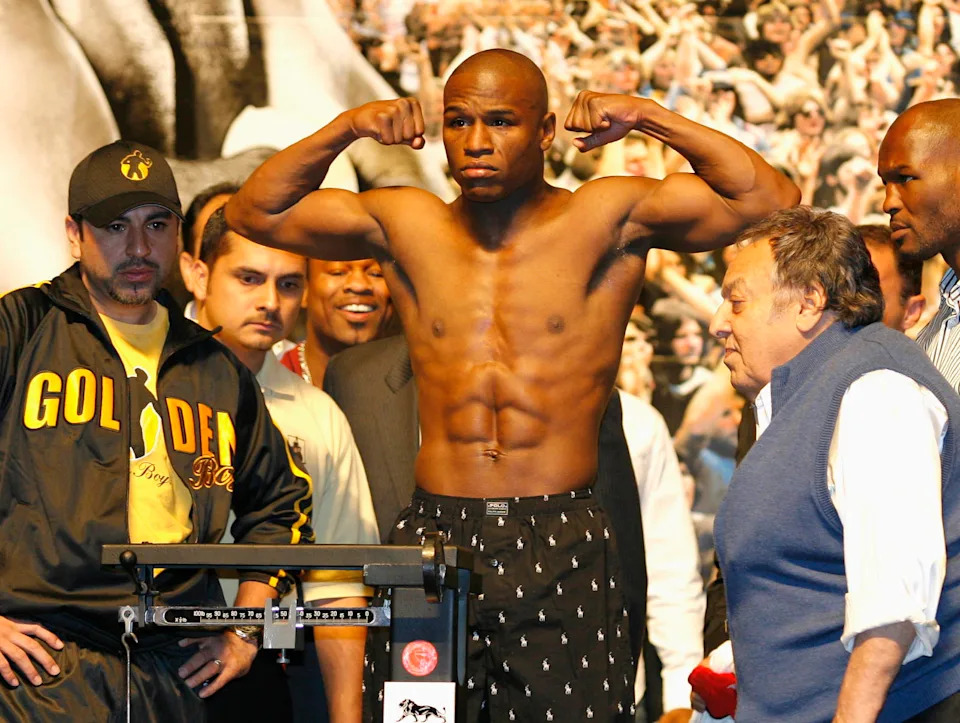 Floyd Mayweather weighs-in for his May 2007 bout against Oscar De La Hoya. Credit: Ed Mulholland - Imagn Images