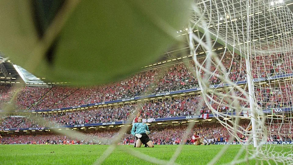 Michael Owen scores