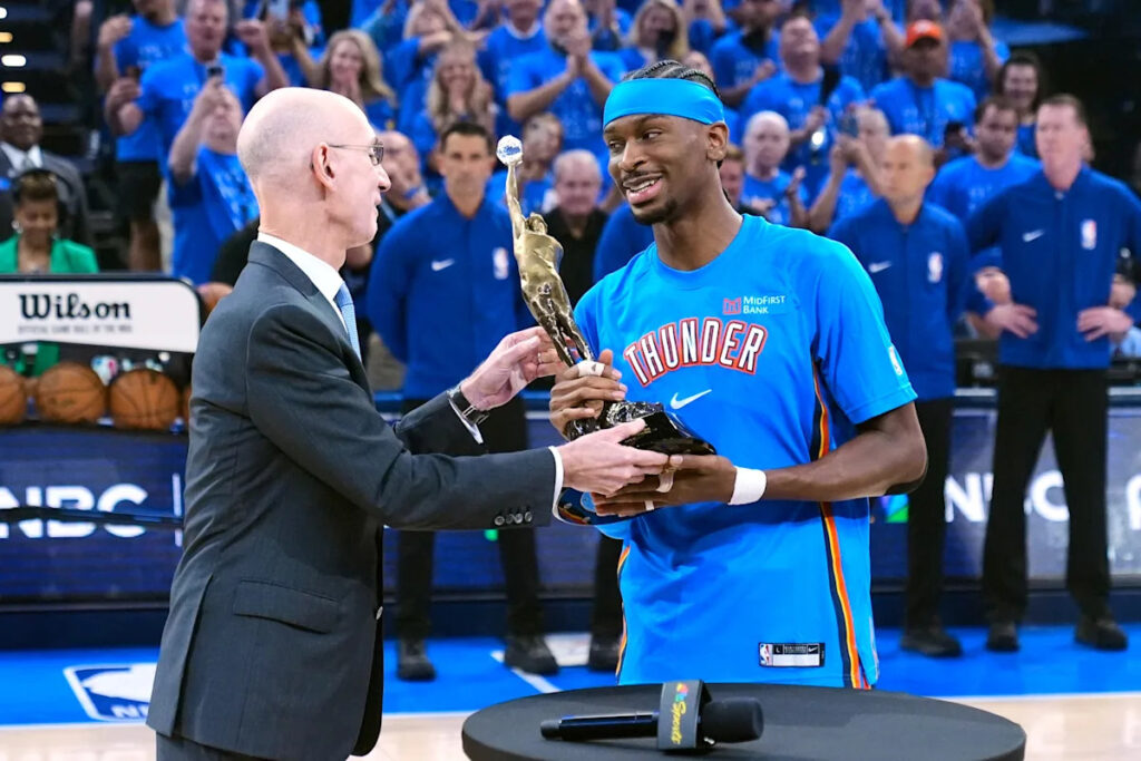 Shai Gilgeous-Alexander gets the MVP trophy from NBA Commissioner Adam Silver Shai Gilgeous-Alexander gets the MVP trophy from NBA Commissioner Adam Silver