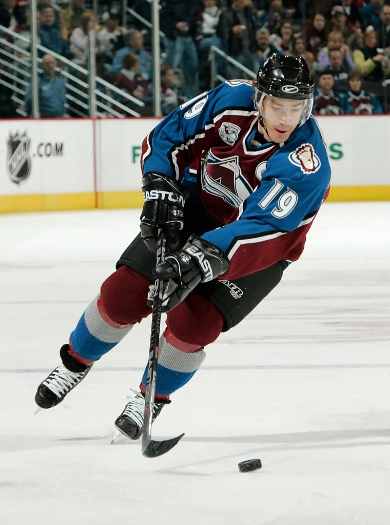 Joe Sakic of the Colorado Avalanche brings the puck all the way down the ice for his first goal against the Phoenix Coyotes in the first period on December 26, 2005 at the Pepsi Center. Getty Images