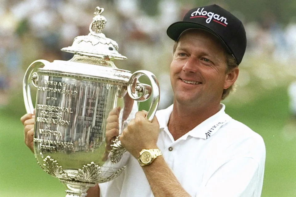 Mark Brooks poses with a trophy after winning the 1996 PGA Championship at Valhalla in Louisville.