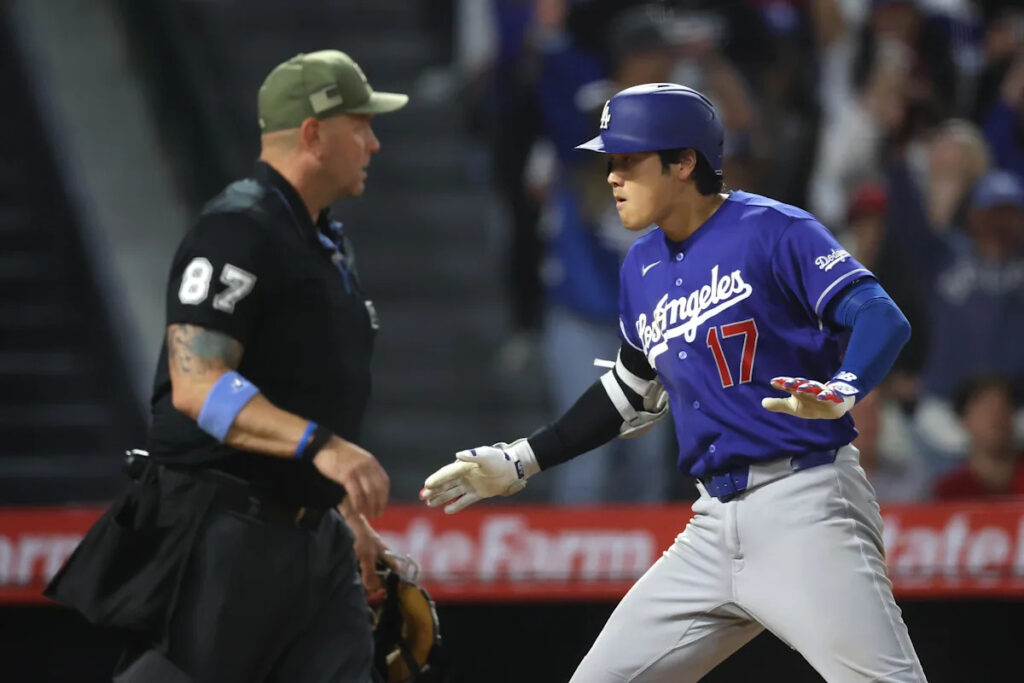 Dodgers walk all over Angels for 4th straight win