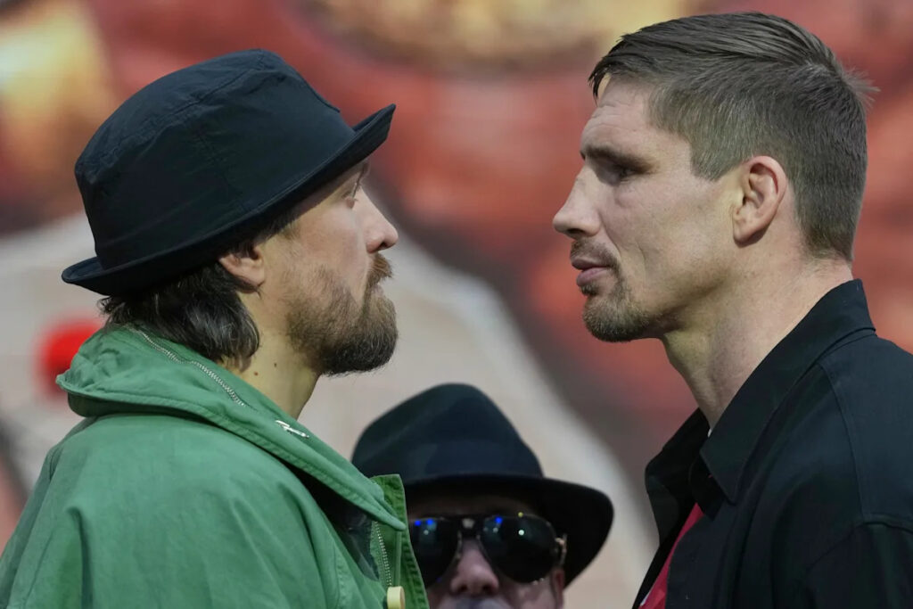 Usyk stops kickboxer Verhoeven in 11th round of heavyweight title fight in Egypt