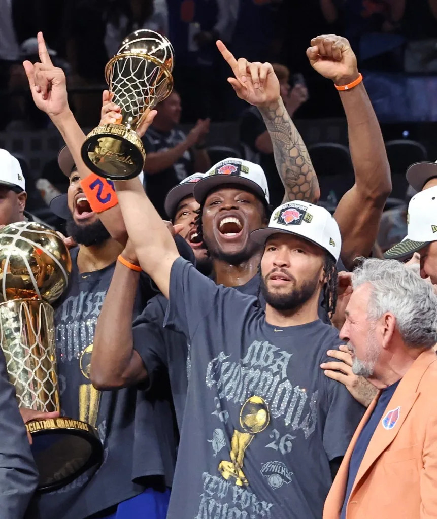 New York Knicks guard Jalen Brunson #11, smiling while holding the Most Valuable Player award. Charles Wenzelberg / NY Post