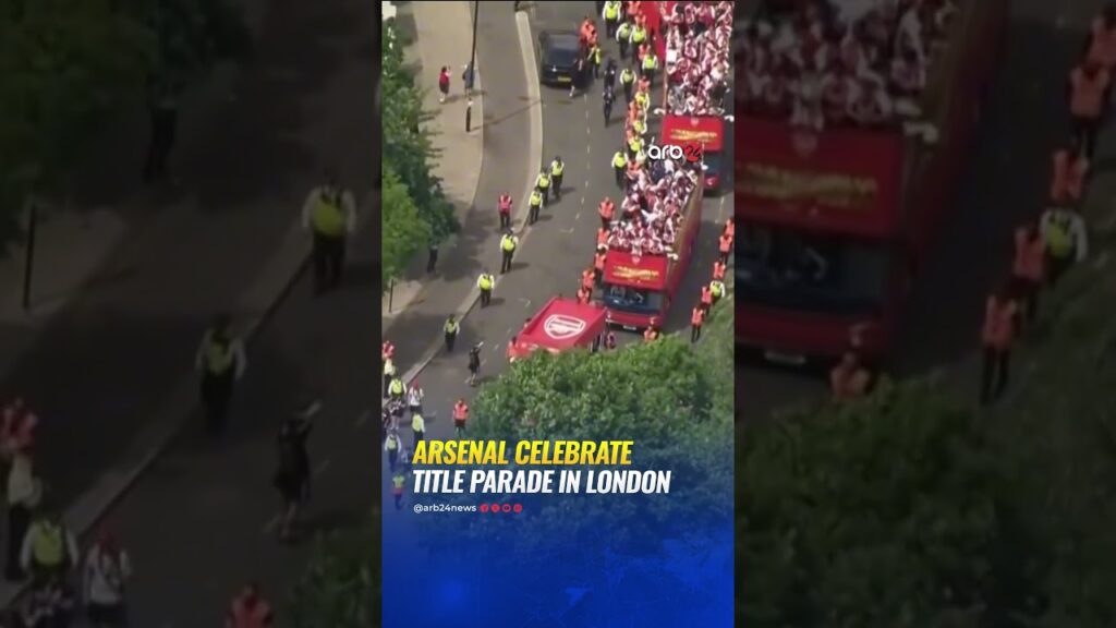 Arsenal fans flood London streets in red smoke after historic Premier League win